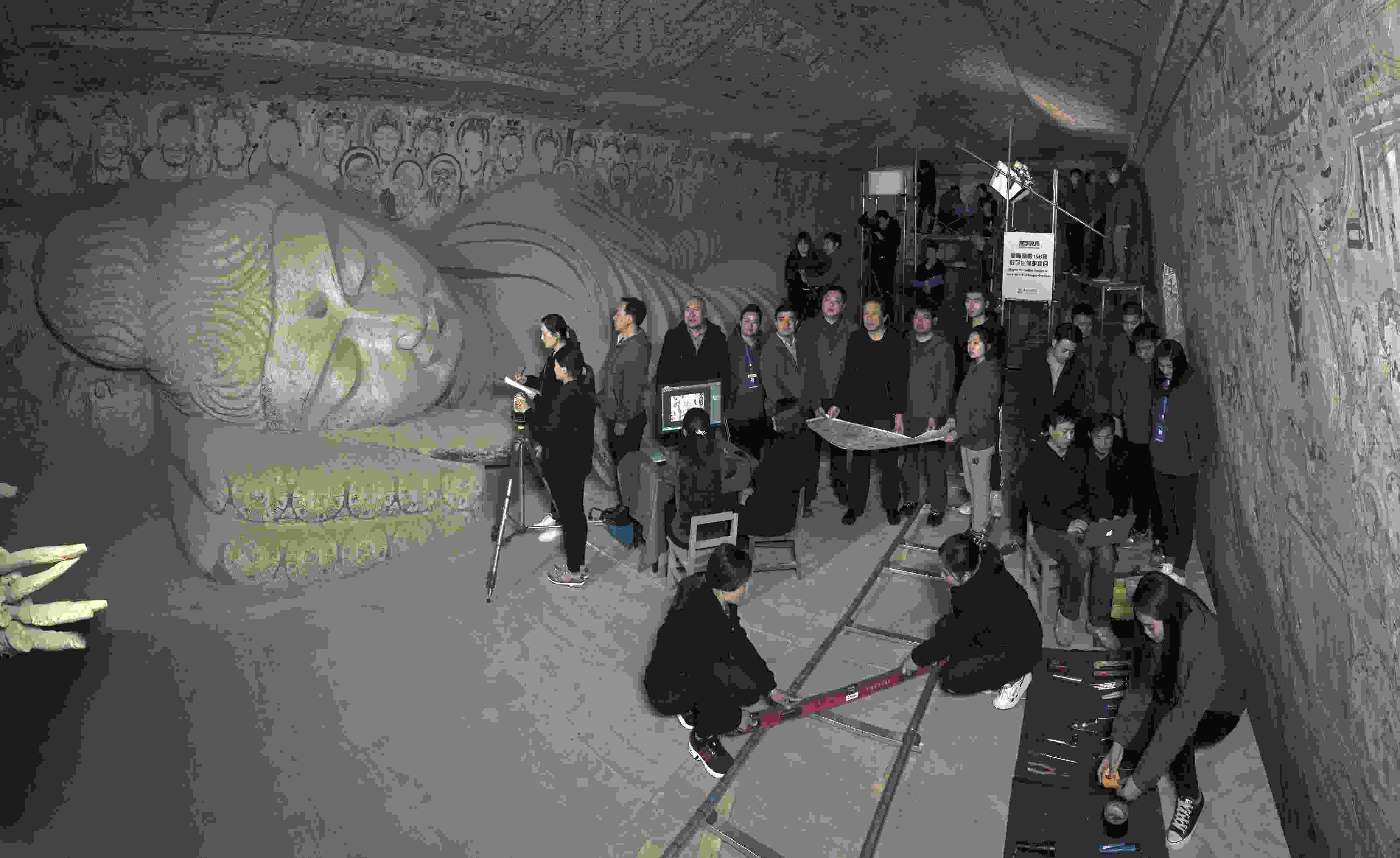 敦煌研究院文物數(shù)字化團隊在莫高窟第158窟工作現(xiàn)場。敦煌研究院供圖