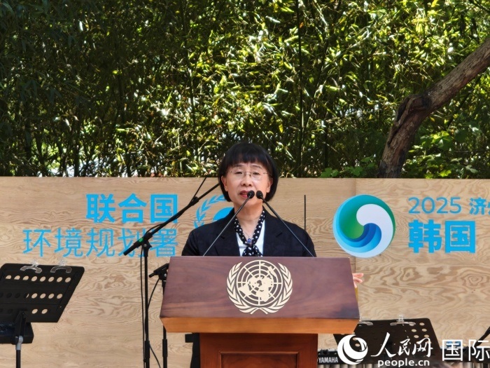 周?chē)?guó)梅致辭。人民網(wǎng)記者 李明攝